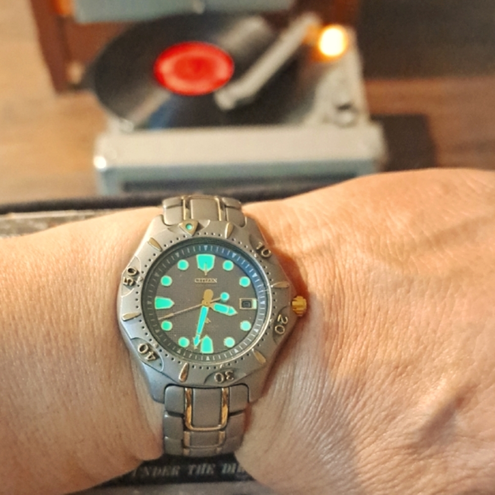 Citizen Men's Watch with Black and Gold Accents